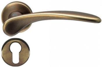 Maniglia per porta interna in ottone Valli & Valli H 198 serie Mizar rosetta bocchetta foro per cilindro Anticato